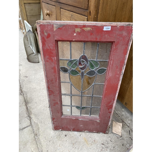 1204 - AN ASSORTMENT OF VINTAGE WOODEN FRAMED STAINED GLASS WINDOWS