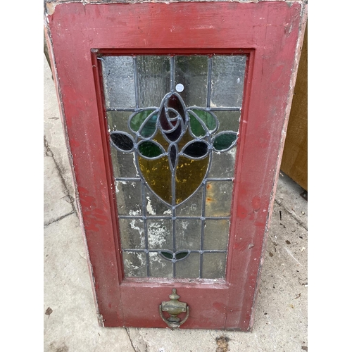 1204 - AN ASSORTMENT OF VINTAGE WOODEN FRAMED STAINED GLASS WINDOWS