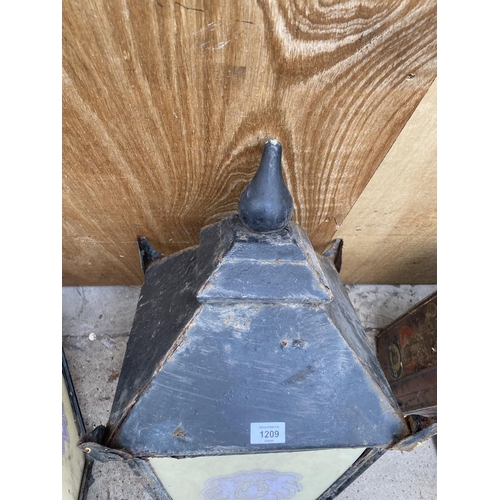 1209 - A PAIR OF DECORATIVE CAST IRON OUTDOOR LIGHTS