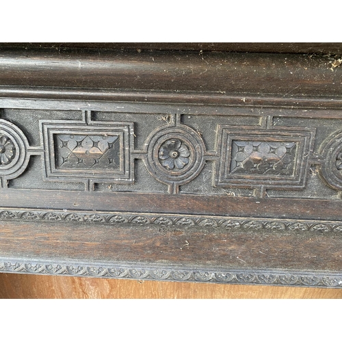 1212 - A VINTAGE WOODEN FIRE SURROUND