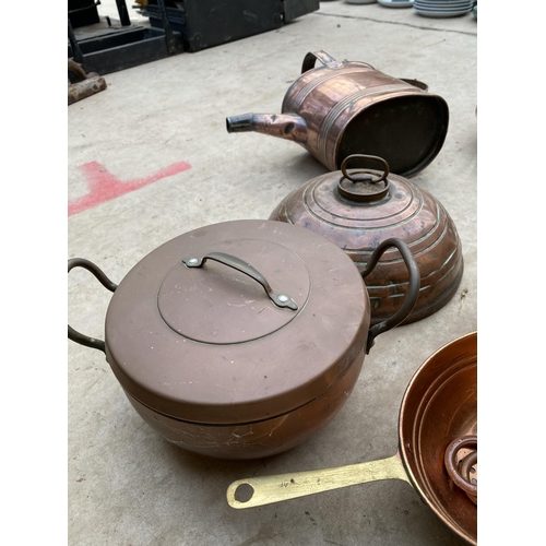 1284 - AN ASSORTMENT OF COPPER ITEMS TO INCLUDE PANS, A WATERING CAN AND SIEVES ETC