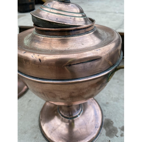 1294 - TWO VINTAGE COPPER URNS AND A FURTHER COPPER SHELF