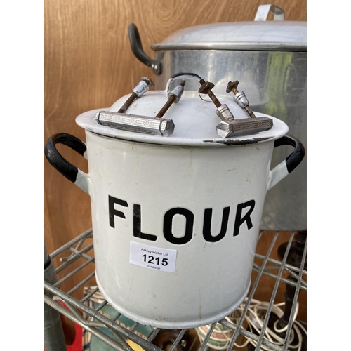 1215 - AN ENAMEL FLOUR TIN, A VINTAGE AND LARGE STAINLESS STEEL COOKING POT