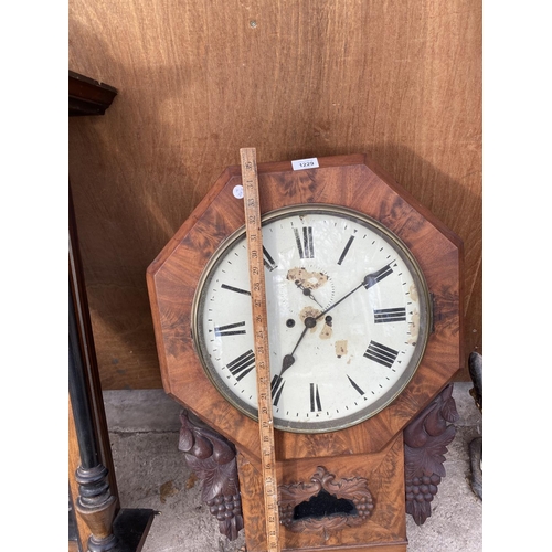 1229 - A DECORATIVE AND CARVED WALNUT WALL CLOCK WITH KEYS (H:88CM)