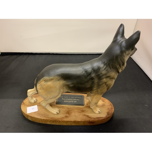 708 - A BESWICK ALSATION GERMAN SHEPHERD DOG ON A PLINTH