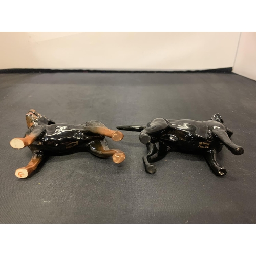 717 - TWO BESWICK DOGS A ROTTWEILER AND A LABRADOR WITH GOLD BACK STAMPS