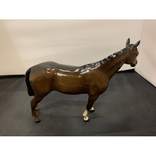 719 - A BESWICK BROWN STALLION