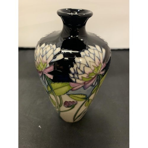 728 - A MOORCROFT TREFOIL VASE 6 INCHES HIGH