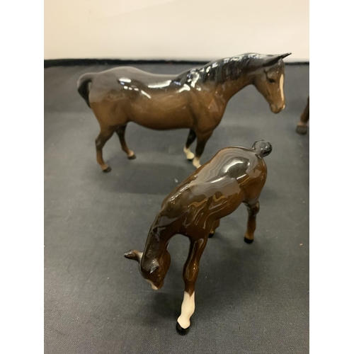 733 - TWO BROWN BESWICK HORSES AND TWO FOALS