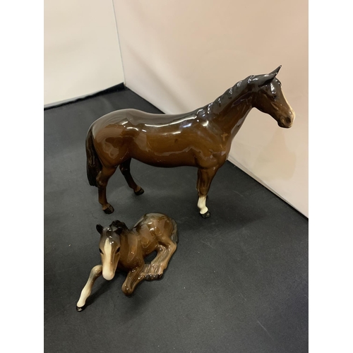 733 - TWO BROWN BESWICK HORSES AND TWO FOALS