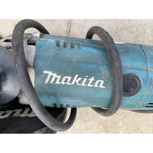 1299 - A MAKITA ANGLE GRINDER WITH A 110V PLUG