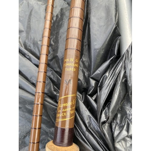 1314 - A SPLIT CANE FISHING ROD AND A LANDING NET