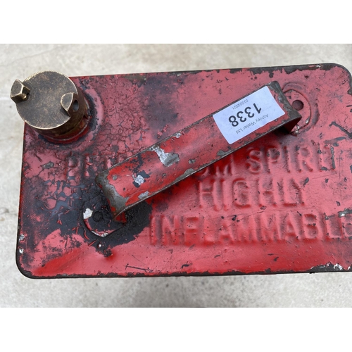 1338 - A VINTAGE RED PETROL CAN AND A FURTHER VINTAGE TOOL TIN