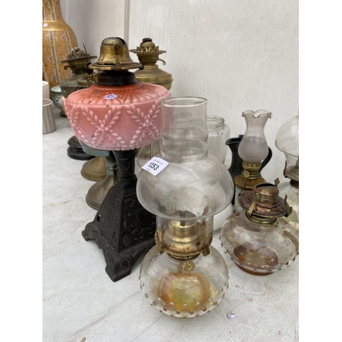 1353 - AN ASSORTMENT OF OIL LAMPS AND OIL LAMP PARTS