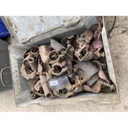 1381 - TWO METAL TOOL CHESTS WITH A LARGE QUANTITY OF SCAFFOLDING BRACKETS