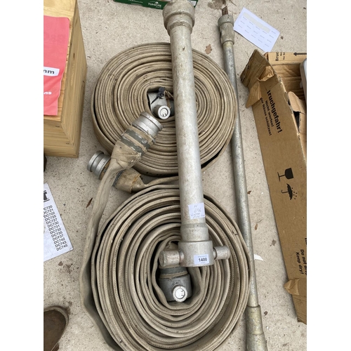 1400 - A LARGE QUANTITY OF FIRE HOSE AND VARIOUS HYDRANT FITTINGS