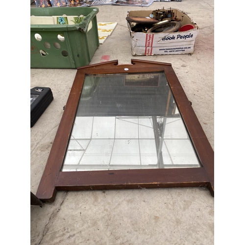 1402 - A DECORATIVE WOODEN FRAMED MIRROR AND A LIGHT FITTING