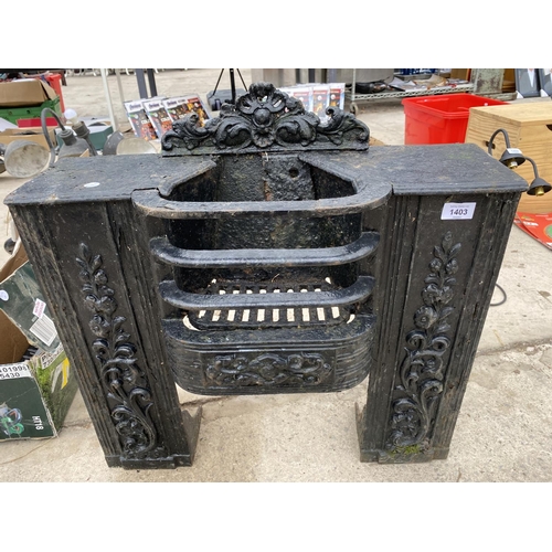 1403 - A VINTAGE AND DECORATIVE CAST IRON FIRE PLACE