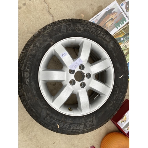 1409 - A FIVE STOOD CAR RIM WITH A MICHELIN 225/65 R 17 TYRE