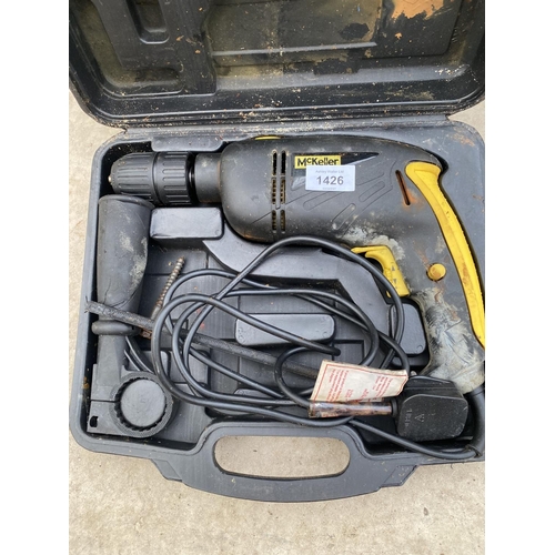 1426 - A MCKELLER POWER DRILL, A TWO RUNG STEP/SEAT AND A GARDENING AID