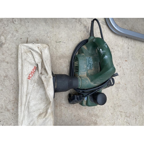 1428 - A BLACK AND DECKER JIGSAW AND A BOSCH WOOD PLANE