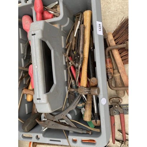 1429 - A LARGE ASSORTMENT OF HAND TOOLS TO INCLUDE PLIERS, AHMMERS, MOLE GRIPS ETC