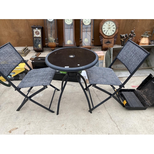 1443 - A METAL BISTRO TABLE WITH GLASS TOP AND TWO BISTRO CHAIRS