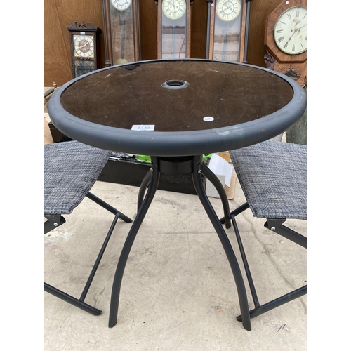 1443 - A METAL BISTRO TABLE WITH GLASS TOP AND TWO BISTRO CHAIRS