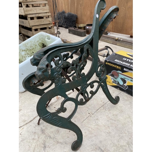 1444 - A PAIR OF DECORATIVE CAST IRON BENCH ENDS WITH LION HEAD HANDLES