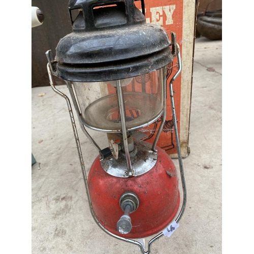 1452 - A VINTAGE TILLEY STORM LIGHT OIL LAMP