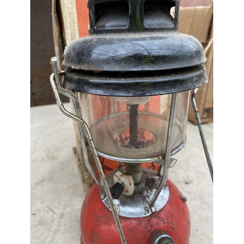 1452 - A VINTAGE TILLEY STORM LIGHT OIL LAMP