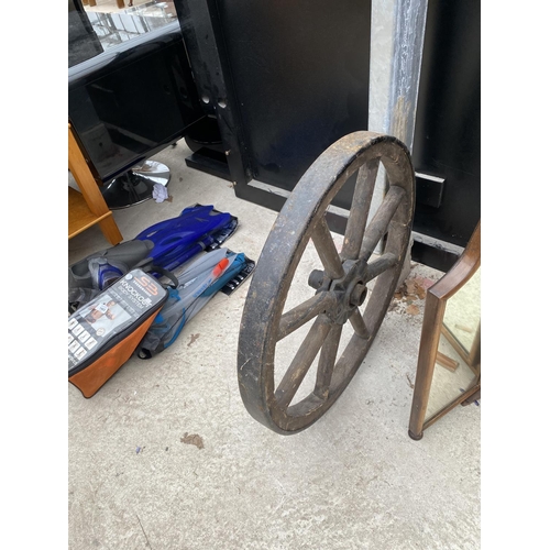 1464 - A VINTAGE WOODEN CART WHEEL WITH METAL OUTER BAND