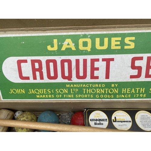 1467 - A BOXED JOHN JAQUES CROQUET SET