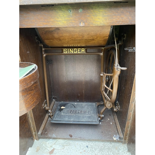 1477 - A VINTAGE SINGER SEWING MACHINE COMPLETE WITH CASE AND ORIGINAL FOOT PEDDLE AND INSTRUCTION MANUAL