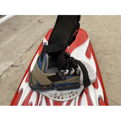 1494 - A FREE MOTION XLR8 SNOW BOARD WITH BINDINGS