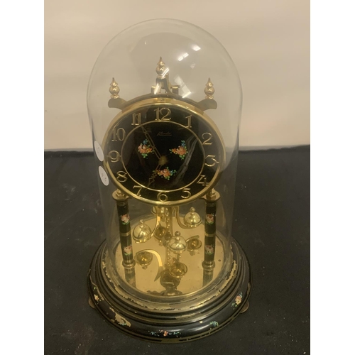 12 - A DECORATIVE MANTEL CLOCK WITH GLASS DOME H: 30CM