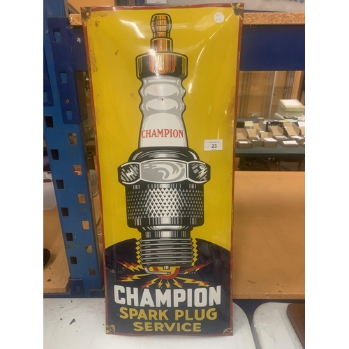 23 - A RETRO METAL 'CHAMPION SPARK PLUG SERVICE' SIGN 70CM X 30CM