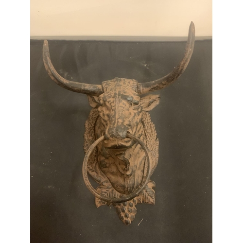 30 - A CAST METAL BULL'S HEAD WITH NOSE RING FOR WALL MOUNTING