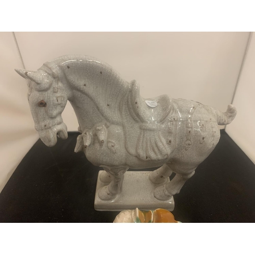 35 - A LARGE CERAMIC HORSE 32CM AND A SMALLER EXAMPLE