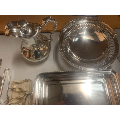 37 - A LARGE ASSORTMENT OF SILVER PLATE ITEMS TO INCLUDE A HEATED MUFFIN DISH, LEMON SQUEEZERS, A VEGETAB... 