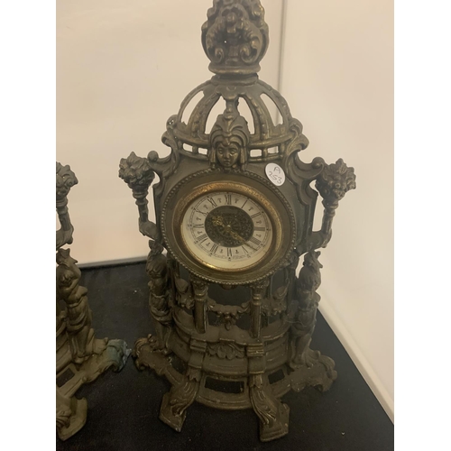 41 - A PAIR OF VINTAGE HOLLOW ORNATE SPELTER MANTEL CLOCKS