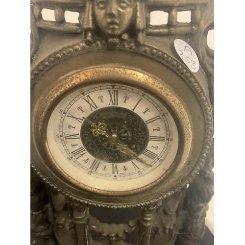 41 - A PAIR OF VINTAGE HOLLOW ORNATE SPELTER MANTEL CLOCKS