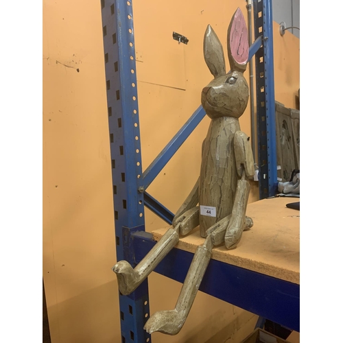 44 - A LARGE WOODEN SHELF RABBIT