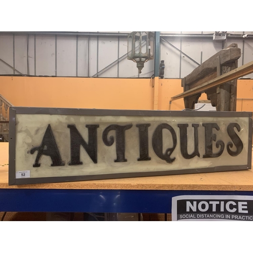 52 - AN ILLUMINATED 'ANTIQUES SIGN'