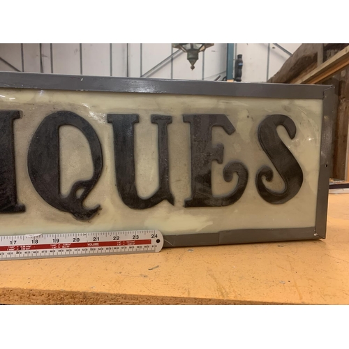 52 - AN ILLUMINATED 'ANTIQUES SIGN'