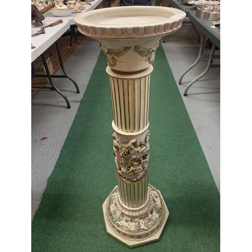 58 - A LARGE ORNATE CAPODIMONTE JARDINIERE WITH CHERUB DETAIL HEIGHT: 92.5CM