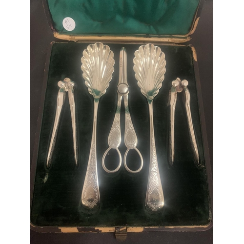 7 - A VINTAGE BOXED SET OF SILVER PLATED FRUIT TOOLS TO INCLUDE A PAIR OF GRAPES SCISSORS AND A PAIR OF ... 