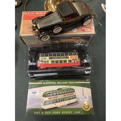 107 - THREE MODELS OF A ROLLS ROYCE PHANTOM RADIO, A BLACKPOOL BALLOON TRAM AND A FELTHAM TRAM