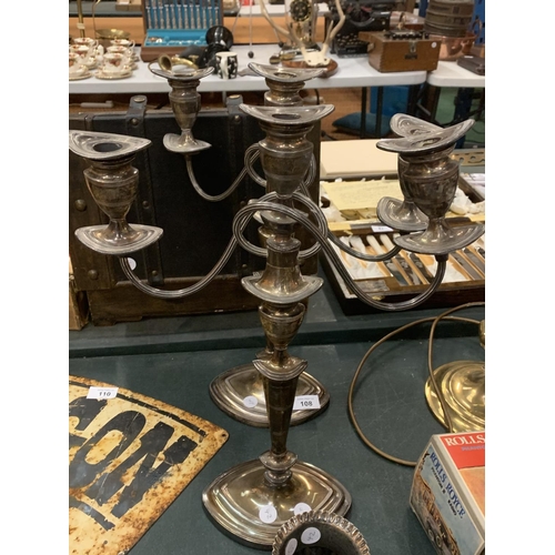 108 - A PAIR OF SILVER PLATED THREE BRANCH CANDELABRAS AND A PAIR OF SMALL URN SHAPED VASES