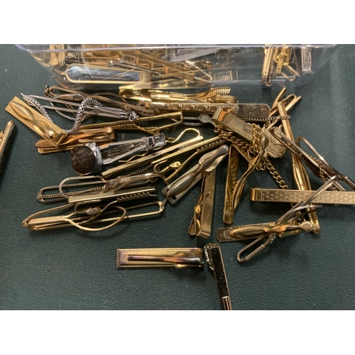 116 - A QUANTITY OF YELLOW AND WHITE METAL TIE PINS